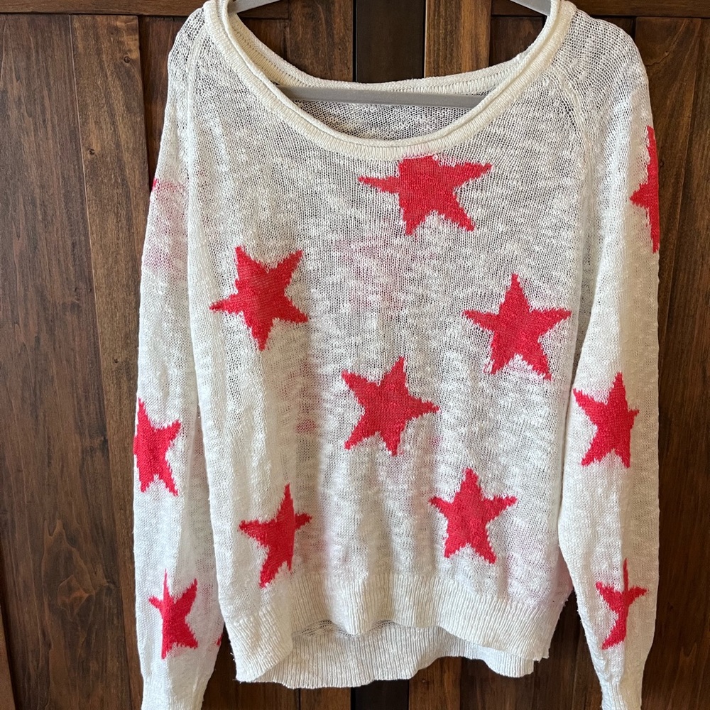 Star sweater. No tag. Fits XL-L. Purchased at Marshall’s.